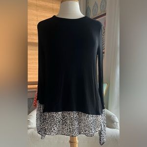 Sweater with faux shirt hem